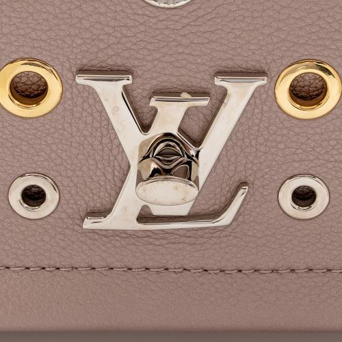 Louis Vuitton Leather Grommet Lockme II BB Bag