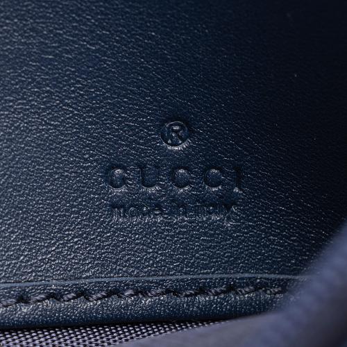 Gucci Canvas Flora Zumi Continental Wallet