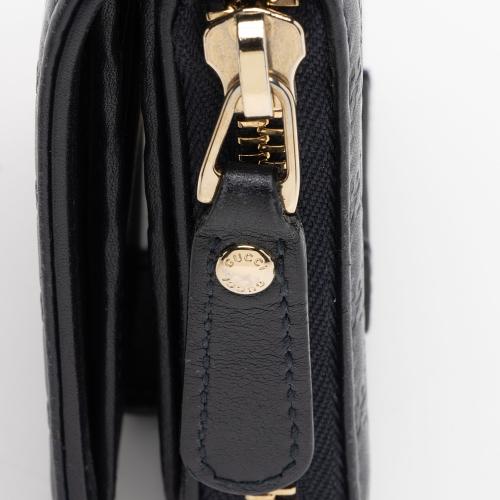 Gucci Microguccissima Leather Compact Zip Around Wallet