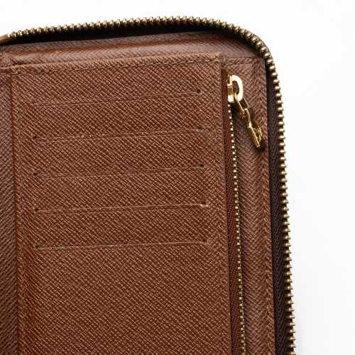 Louis Vuitton Monogram Canvas Vertical Compact Zippy Wallet