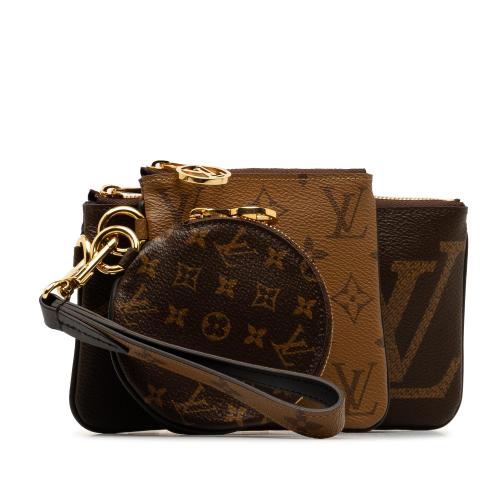 Louis Vuitton Monogram Reverse Giant Trio Pouch